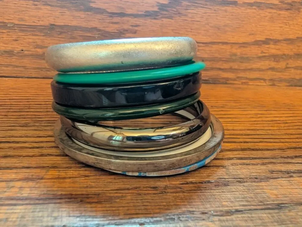 Vintage Stack Of Plastic And Silver Bangels Bracelets